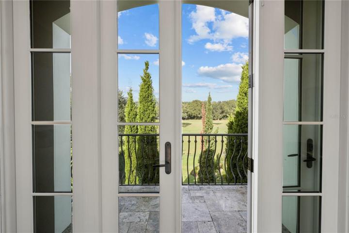 With balcony overlooking the golf course