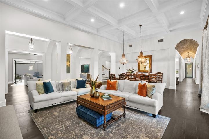 Barreled, brick archway leads to kitchen