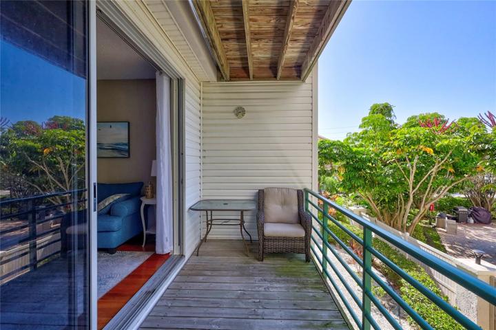 The sliding glass door not only brightens the room but also provides easy access to the outdoors, making it a breeze to enjoy the views outside.