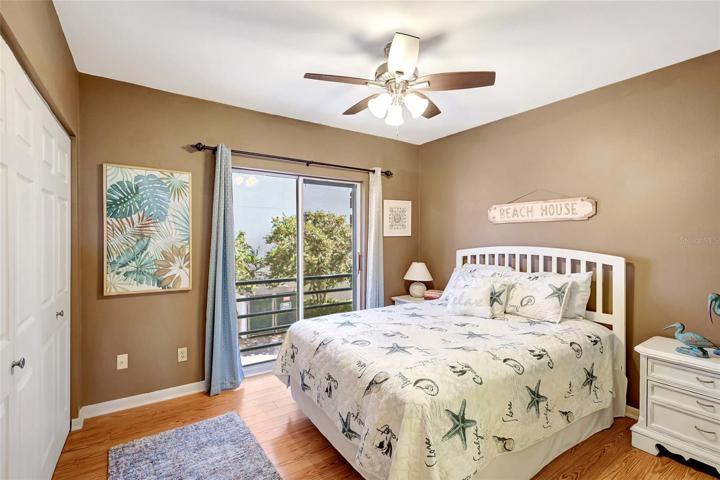 Natural light fills the room, creating a warm and inviting atmosphere. Thanks to the huge sliding window of this room.