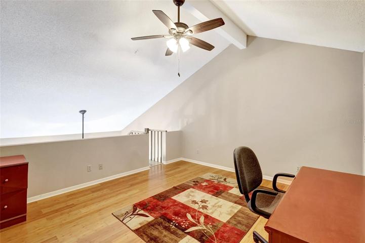This cozy loft space is perfect for creating a private retreat, an office, or an additional relaxation area.