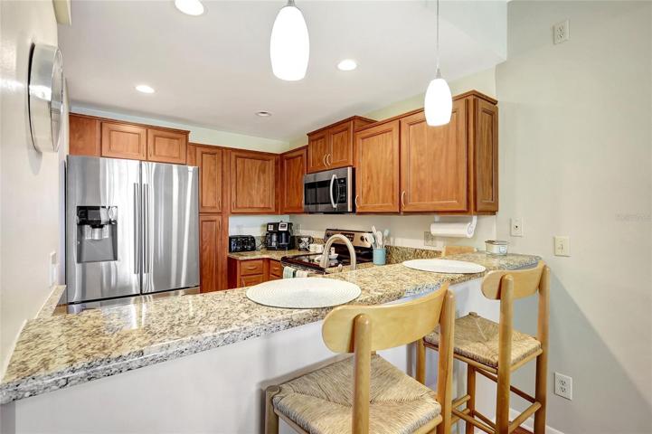 This handy feature provides extra counter space for cooking and meal prep, making it a chef's dream. It's also a great spot for casual dining, homework, or simply chatting while you cook.