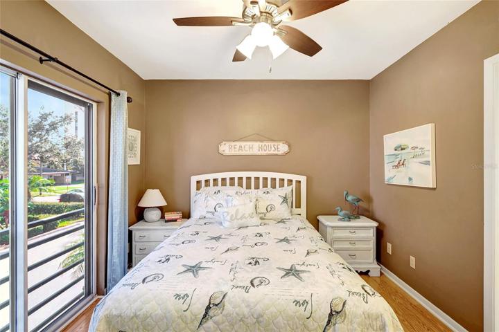 Step into one of the inviting bedrooms of this townhome. It's a cozy and comfortable space, perfect for relaxation and rest.