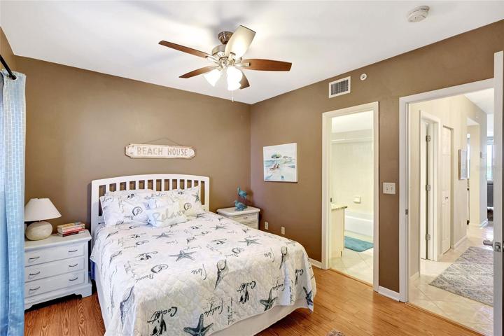 This bedroom offers comfort and practicality with easy access to a nearby bathroom. Experience the convenience of this connected bedroom and bathroom in your new home.