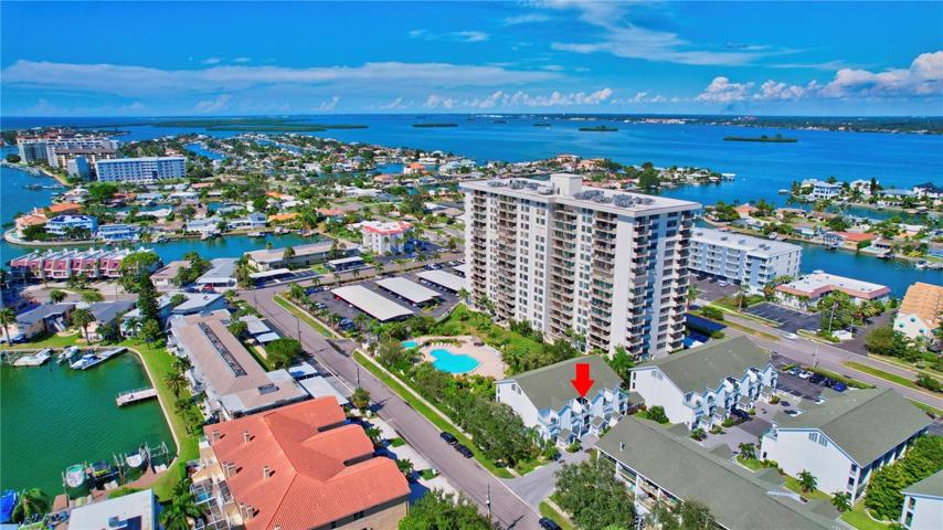 From this vantage point, you'll witness the townhome's prime location within a tranquil neighborhood.