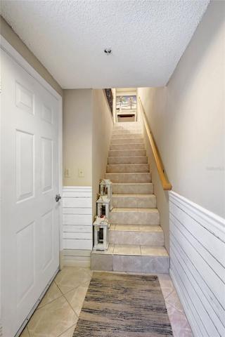 Ascend to the second floor of this townhome via the inviting staircase. The journey upstairs is comfortable and well-lit, ensuring convenience in your daily living.