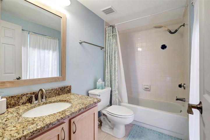 The bathroom also includes all the essentials you need, from a sink and a toilet to a bathtub or shower, ensuring your daily routines are a breeze.