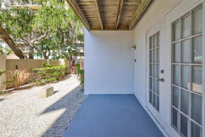 This patio is a versatile area that can be customized to your liking, whether you want to create a cozy seating area or a small garden oasis.