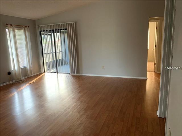 View from entrance. Sliding doors exit toward porch and storage room where you will find washer and dryer.