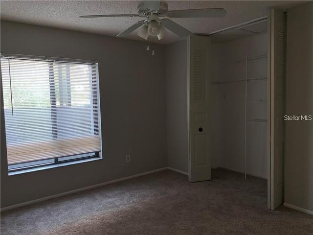 Primary bedroom with spacious closet.