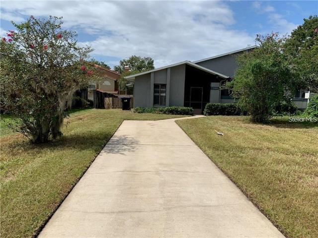 Property located in cul-de-sac, with a long driveway which leads to entrance.