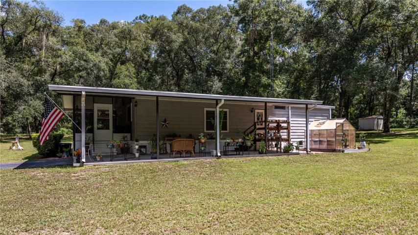 Welcome home to this well maintained, adorable 2/2 manufactured home on over 1 acre