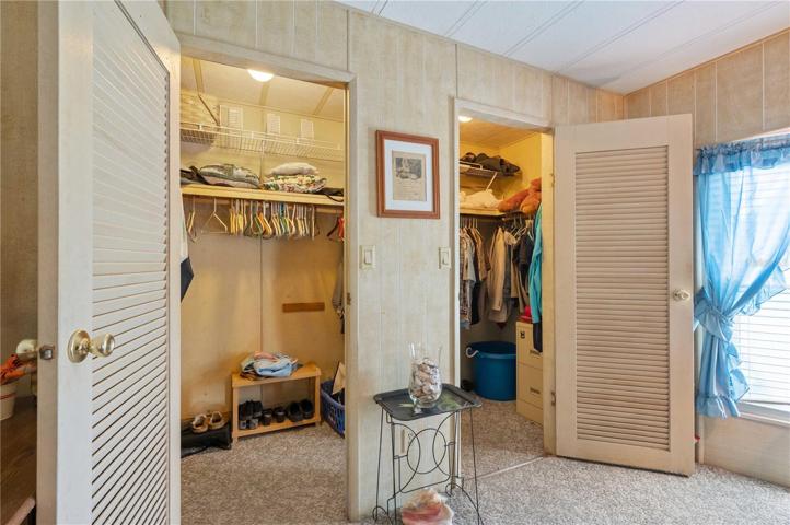 Master closet has plenty of storage.