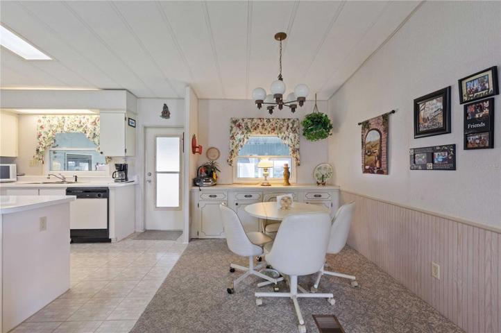 Open eating space with kitchen.