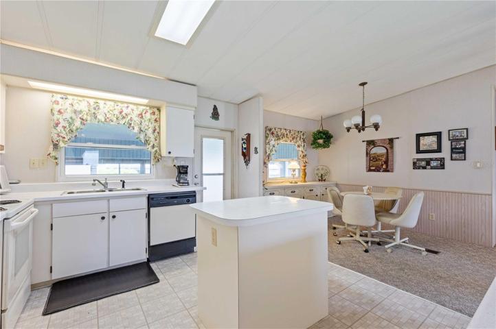 Open concept home between kitchen, living, and eat in kitchen.