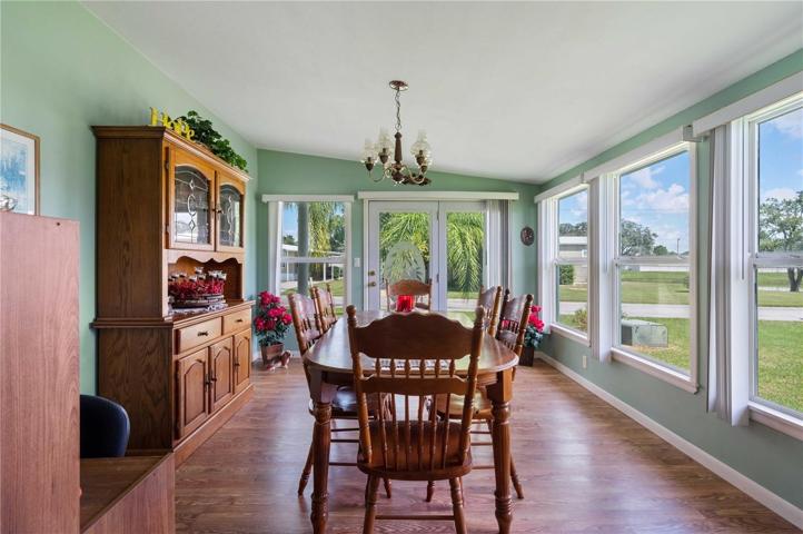 Formal dining area is open with living room.