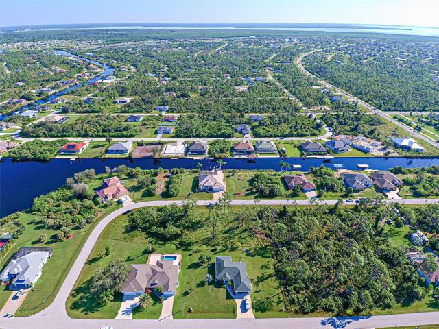 AERIAL VIEW FROM ABOVE SHOWCASING THE CANALS THAT LEAD TO THE GULF