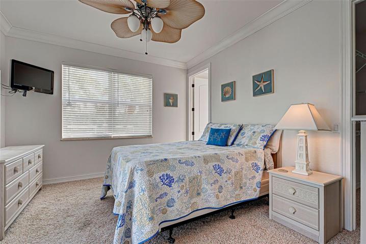 GUEST BEDROOM WITH EN-SUITE BATHROOM AND ACCESS TO LANAI