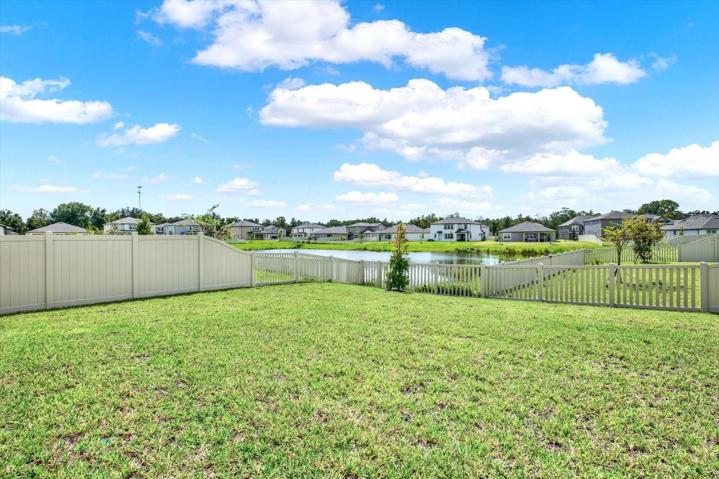 Fenced Backyard water view