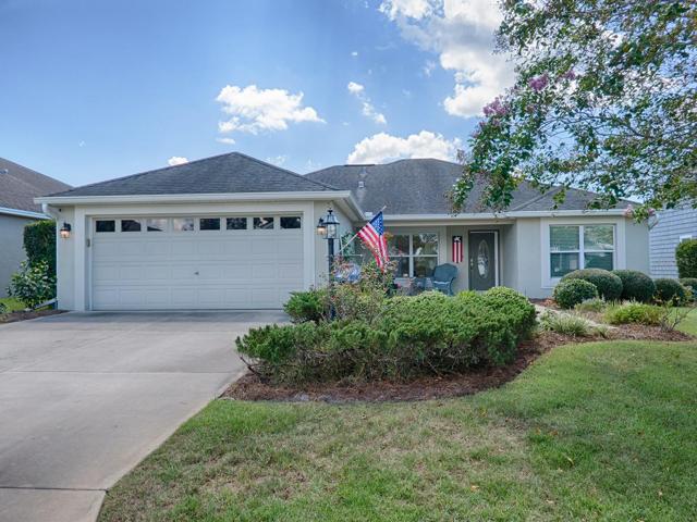 BOND PAID!!! 3/2 "ALLAMANDA" DESIGNER FRESHLY PAINTED EXTERIOR IN THE VILLAGE OF PENNECAMP.