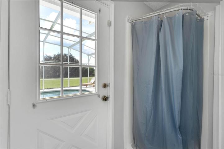 LAUNDRY/ SHOWER / POOL ACCESS AREA