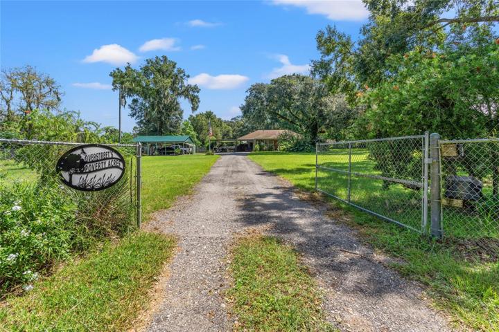 Electronic gate- completely fenced yard....almost 2 acres total