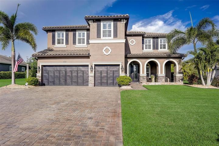 Grand curb appeal with extended paver driveway