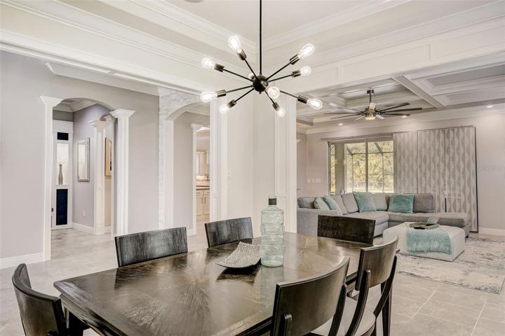Dining room looking at family room, foyer, sitting area/cubby leading into back hall