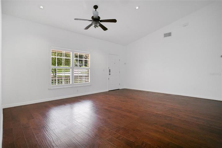 Engineered wood floors and plantation shutters in the living room