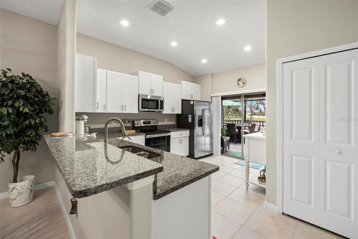 Breakfast Bar with Granite Countertops