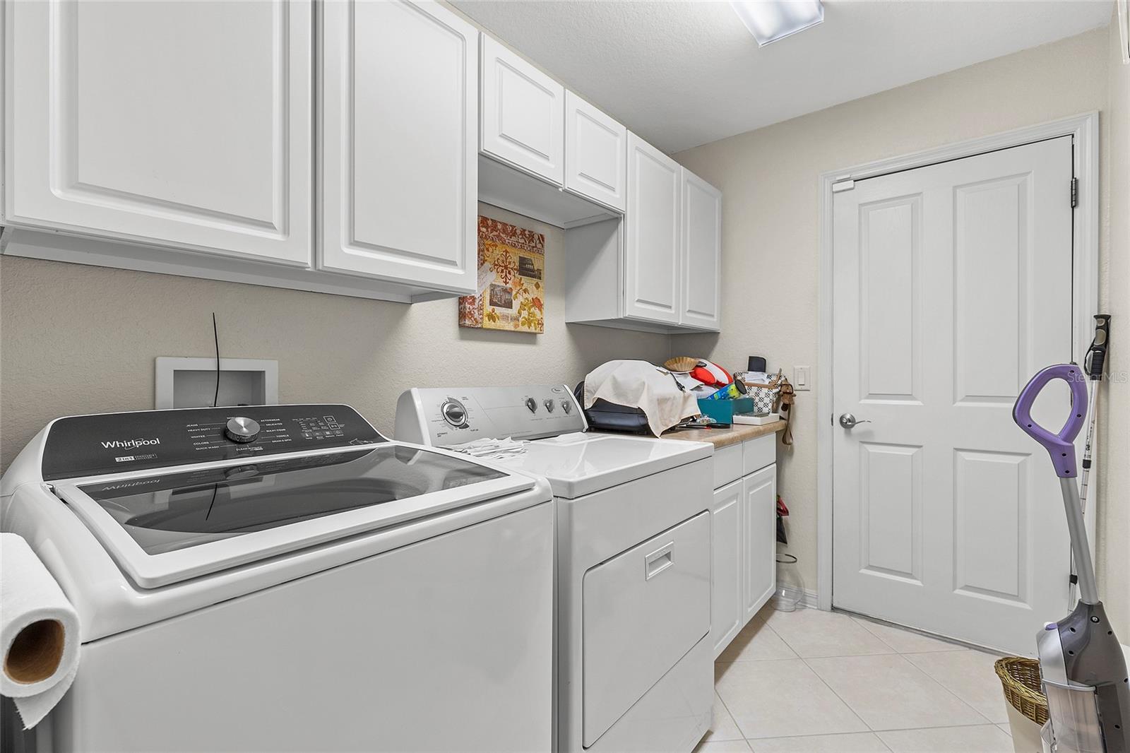 Inside laundry room with censor controlled lighting