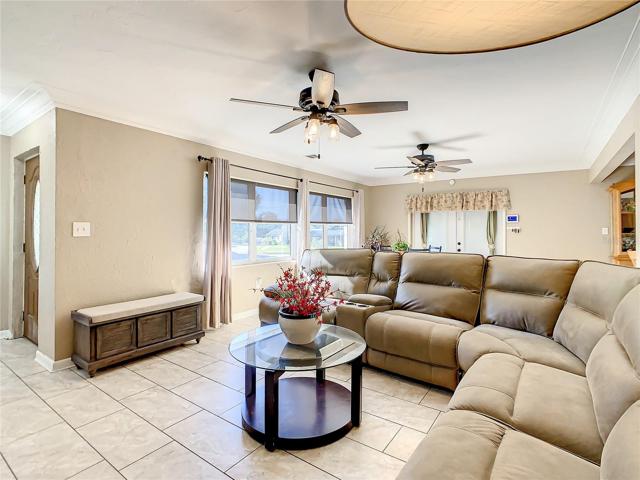 Walk through the front door and you will love how natural light fills the living room and welcomes you inside