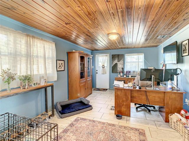 Bedroom #4 is currently used as a home office with high-speed internet connected and it includes a built-in bedroom closet