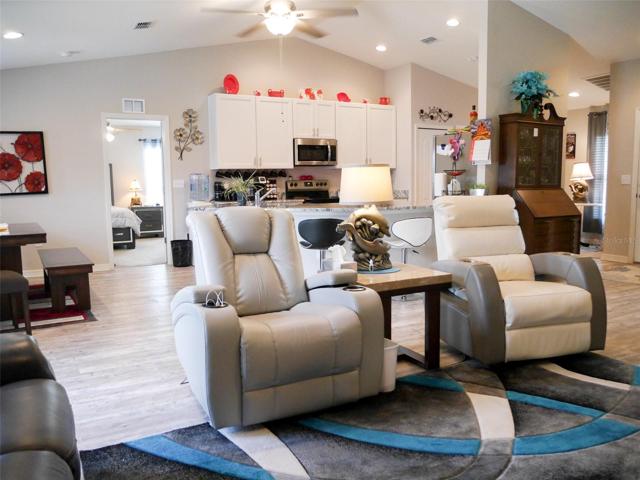 Open to kitchen and dining