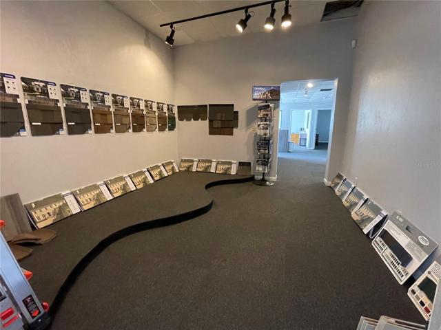 Showroom that splits conference room and offices