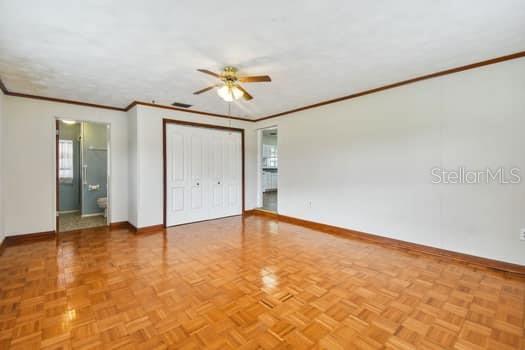 spacious 17x14 master with parquet wood floors, ensuite bath and large cedar closet.