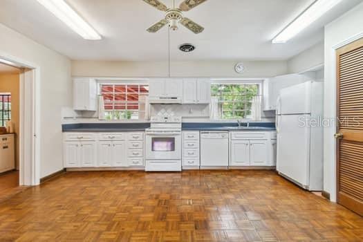 Light and bright Kitchen overlooking the backyard.