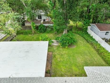 Large fenced backyard perfect for outdoor activities. Plenty of room for a pool or an addition to existing home.