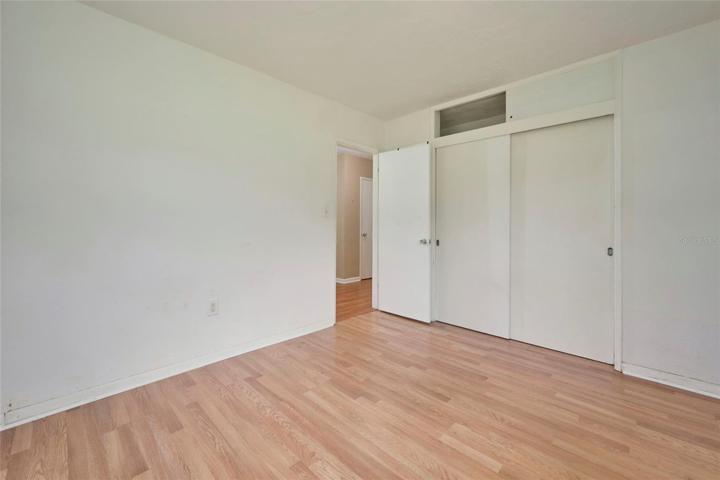 Bedroom 2 with view of closet