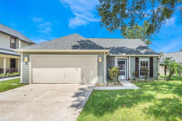 Nestled in the highly sought-after Alafaya Woods Community of Oviedo, this beautifully updated 3-bedroom, 2-bathroom home offers a NEW ROOF (2020), an UPDATED A/C and WATER HEATER (2022) and a perfect blend of modern comfort and style!