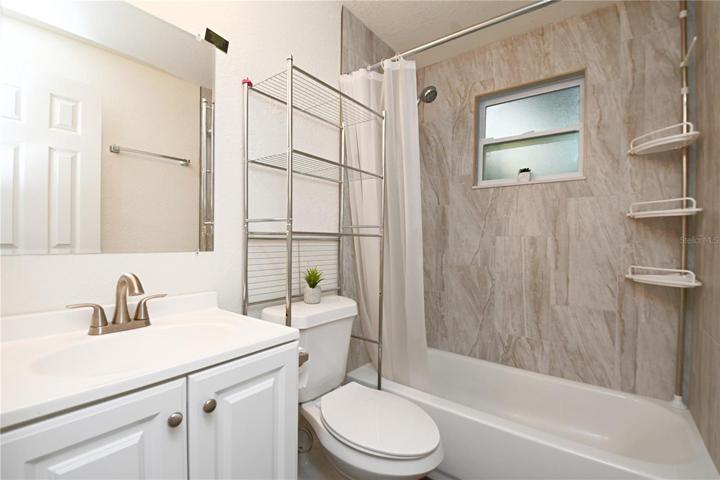 Bathroom #2 has been completely remodeled and is featuring a new vanity with sparkling quartz countertop and bathtub/shower combo.