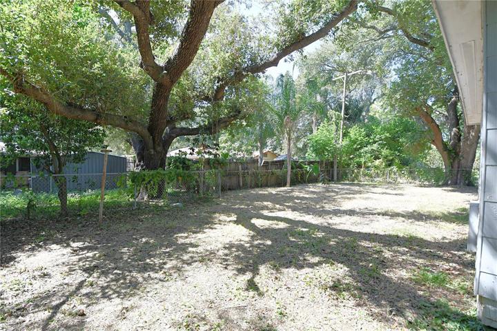 The back yard is fully fenced.
