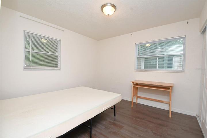 Bedroom #2 features 2 windows and luxury vinyl flooring.