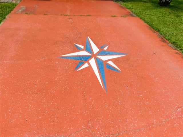 This home has a painted driveway.