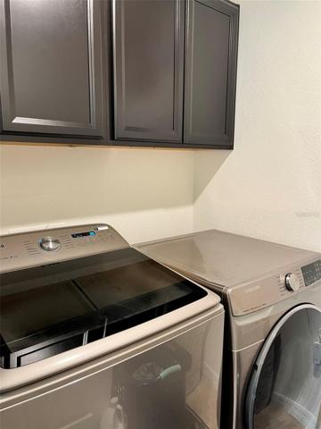 Solid wood cabinets in the laundry room
