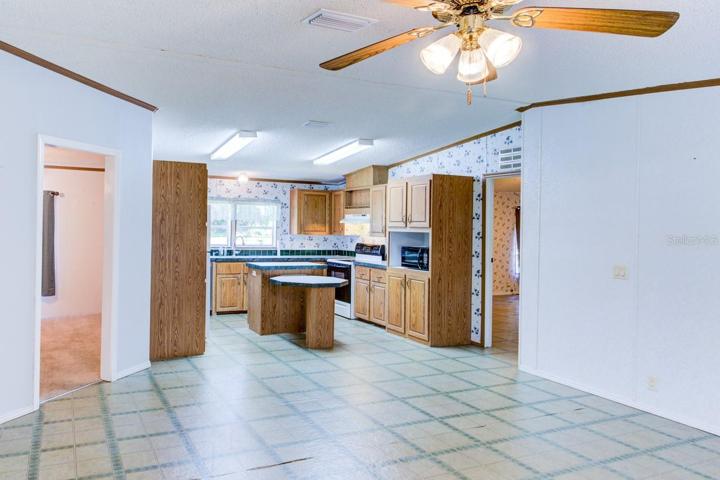 Family room looking in to the kitchen area.