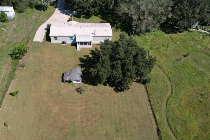 .92 of an acre and view of the home.