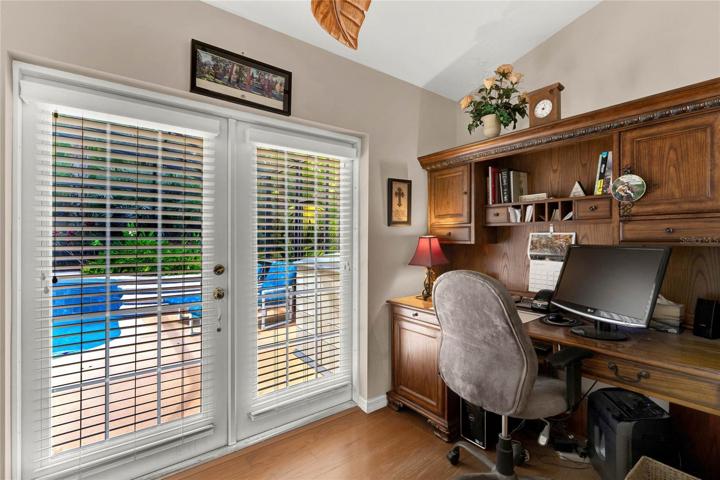 Additional sitting area/office space in master bedroom with separate entrance to pool