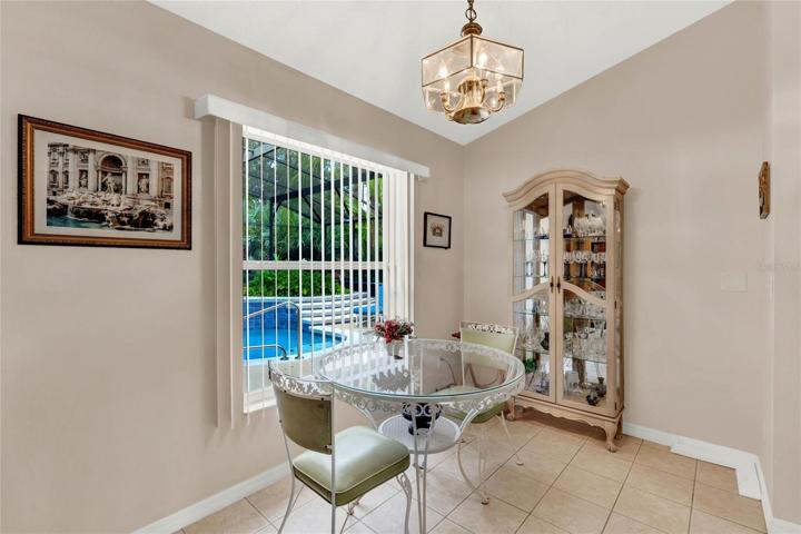 Additional eat-in kitchen space with view of your pool