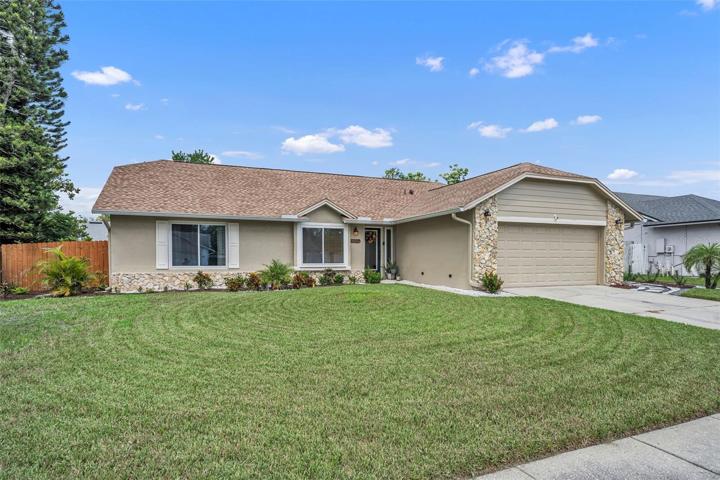 Welcome to beautiful 980 Dinero Drive in Winter Springs!